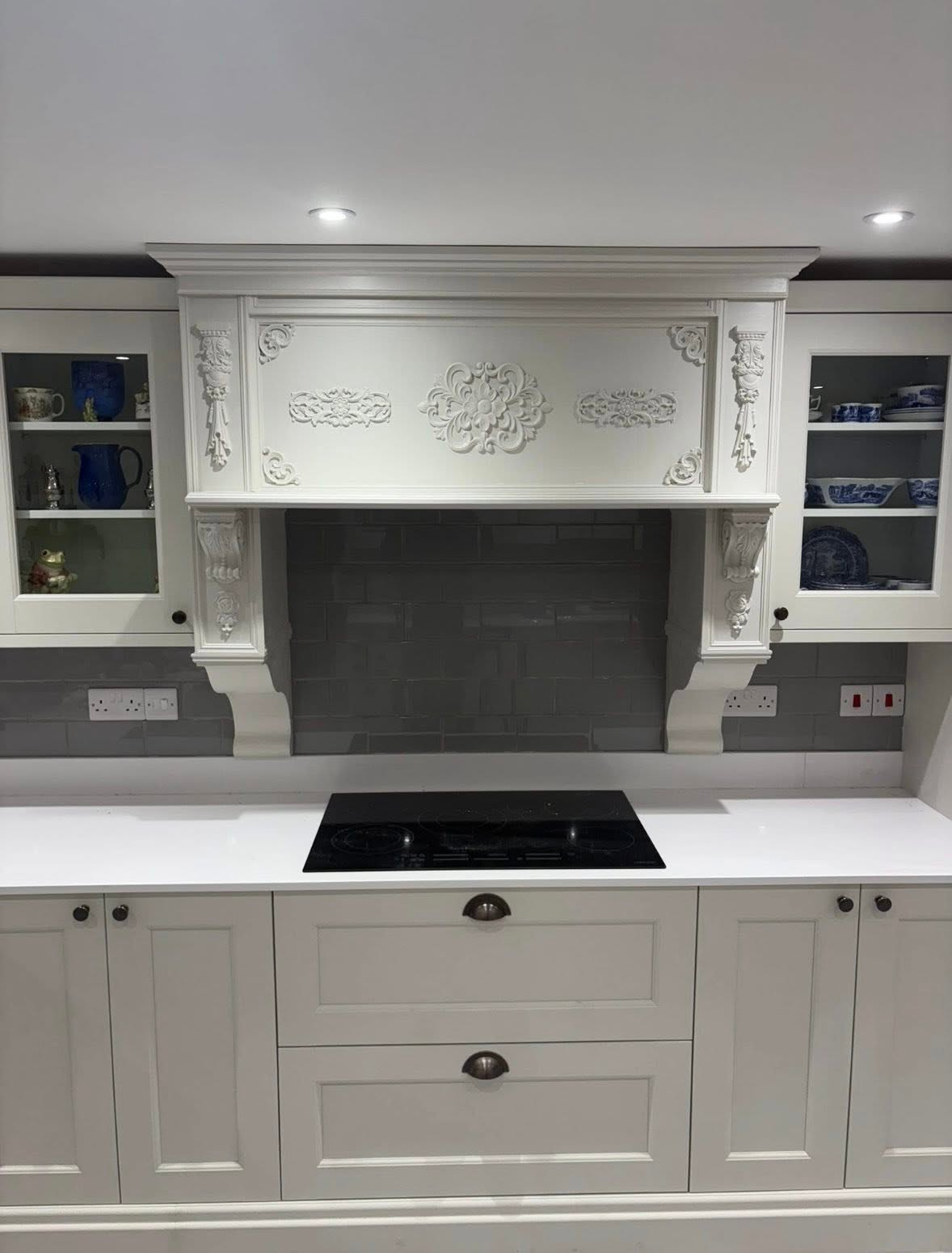 Ornate white kitchen range installed by Newiams